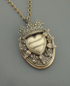 Valentines Gift - Vintage Jewelry - Vintage Locket - Vintage Necklace - Brass jewelry - Heart Necklace - Crown Necklace - handmade jewelry This is an extraordinary piece! An exquisite heart and fancy royal crown embellishes the front of this vintage etched large locket. Spiritual Bronze Jewelry For Anniversary, Vintage Charm Jewelry For Valentine's Day, Bronze Engraved Jewelry For Anniversary, Collectible Medallion Jewelry For Valentine's Day, Personalized Antique Jewelry For Valentine's Day, Anniversary Metal Medallion Jewelry, Vintage Heart Pendant Jewelry For Memorial, Bronze Vintage Charm Jewelry For Anniversary, Bronze Jewelry With Vintage Charm For Anniversary