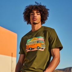 Step back in time with our Vintage Camper Graphic Deep Olive Green T-shirt, part of our exclusive VINTAGE series. This stylish T-shirt features a classic camper van design, bringing a nostalgic vibe to your casual wear. The combination of vibrant colors and retro details makes it perfect for anyone who loves adventure, road trips, and a bit of vintage charm. The design captures the essence of freedom on the open road, making it an ideal choice for travelers and free spirits. Crafted from high-quality cotton, this T-shirt provides a soft, breathable fit for maximum comfort during all your adventures. Whether you're exploring nature or just hanging out with friends, the relaxed fit and durable fabric make it perfect for any occasion. The deep olive green color complements the graphic beautif Green Retro Camp Shirt With Relaxed Fit, Retro Green Camp Shirt For Vacation, Green Graphic Tee For Camping, Camper Van Design, Green Graphic Print T-shirt For Outdoor, Olive Green T Shirt, Green Graphic Print T-shirt For Camping, Deep Olive Green, Classic Campers