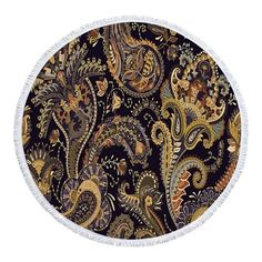 a round black and gold rug with an ornate design on the center, in front of a white background