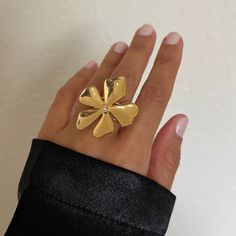 Compare at $38! Save more than 20% when you buy Margo as a set. We are kicking subtle out of the curb with Margo. Flowers rarely go out of style, and this one is for the feminine woman who dares to take flowers beyond spring. This statement earring duo & ring is all the feels. A delicate flower adorned with a dainty white cubic zirconia in the center. Margo is fit for any occassion. Details Waterproof and Tarnish Free Material: Stainless Steel dipped in 18k gold Flower Size: 33mm length & Width Freshwater Pearl Jewelry, Feminine Women, Perfect Cocktails, Statement Earring, The Feels, All The Feels, Gold Stone, Gold Flower, Delicate Flower