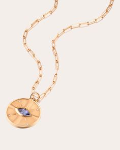 A symbol of feminine power, this Egyptian-inspired necklace features a disc-shaped pendant that's crafted from recycled 18k yellow gold and inlaid with diamonds and tanzanite for just the right amount of sparkle. 14k recycled gold, diamond, tanzanite Diamond: 0.06 tcw Tanzanite: 0.74 tcw Lobster claw closure Clean with warm water and detergent-free soap Handcrafted in NYC Measurements Chain length: 20in Sustainability Metrics: Circular Economy: product is intentionally designed with 50% of activ Timeless Tanzanite Yellow Gold Jewelry, Gold Tanzanite Oval Jewelry, Yellow Gold Tanzanite Oval Necklace, Fine Jewelry Tanzanite Necklace, Round Tanzanite Jewelry With Polished Finish, Polished Round Tanzanite Jewelry, Gold Tanzanite Pendant Necklace, Luxury Tanzanite Gold Necklaces, Yellow Gold Tanzanite Pendant Necklace