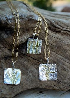 "Sterling and Gold Woodland Necklaces, Artisan Necklace, Botanical Necklaces, Handmade Necklaces These are the perfect introductory necklaces if you are new to Woods and Willow and want to purchase something small at first to determine quality and workmanship! All pieces are made at the time of the order and are similar to the photos but are all one-of-a-kind! These are not cast pieces are all handmade. They are organic by intention and are about 3/4\" square. The edges are formed to be curved a Necklaces Handmade, Metalsmithing Jewelry, Artisan Necklace, Beachglass Jewelry, Disc Necklace, Trombone, Jewelry Inspo, Recycled Sterling Silver, 14kt Gold