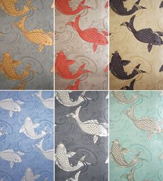 four pictures of fish in different colors and patterns on a wallpapered surface with water waves