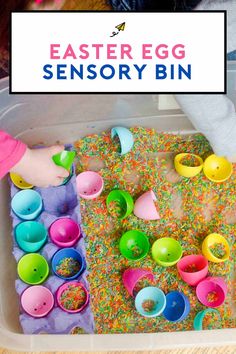 an easter egg sensory bin with sprinkles and eggs