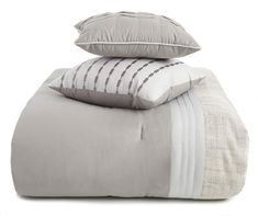 three pillows stacked on top of each other