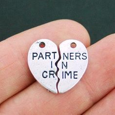 Partners in Crime antique silver tone charms, in a zinc alloy metal. Perfect for bracelets, pendants, earrings, zipper pulls, bookmarks and key chains! Measurements: 19mm x 10mm Hole Size: 2mm. You will receive: 2 Charms. (4 Individual Pieces) Need more? Just send us a message through the contact us form, instant chat, or at mailto:info@bohemianfindings.com. Bulk pricing is available! All of our products are lead free and nickel safe. As they contain small parts, all items are for adult jewelry/ Key Chains, Crafts To Make, Jewelry Crafts, Zinc Alloy, Antique Silver, 2 Piece, Silver Tone, Enamel Pins, Charms