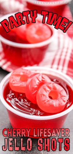 red jello shots in plastic cups with text party time cherry life saver jello shots