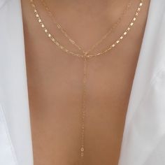 Attached layers, includes everything pictured Material: gold plated brass Length: 16" + 3" extension Drop: 3.5" IMPORTED