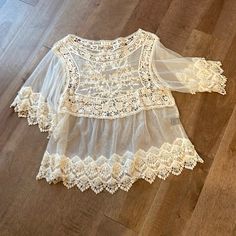 Beautiful Boutique Lace & Crochet Detail Blouse. Never Worn-Nwot 100% Cotton Bust 18.5" Pit-Pit Length 25" Sheer One Size Fits Most But Listed As Medium (Please See Measurements) Bin 33 Rayon Pants, Jelly Shoes, Lace Crochet, Crochet Details, Pajama Shirt, Trending Accessories, Jean Coat, Trending Shoes, Beautiful Dresses