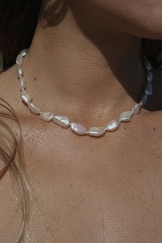 Straight from the ocean, no two pearls are alike. Featuring 100% baroque pearls, our Isabella necklace can be dressed up or down. Wear her out to the beach, and then out to dinner that same night. 14K gold-filled jewelry is water resistant and hypoallergenicEach gemstone is one of a kind, please note the possibility of natural inclusionsHandmade with love in Los Angeles 14K Gold-Filled Gold-filled jewelry consists of outer layers of solid gold bonded or pressed with other inner metals. Gold-fill Isabella Necklace, Baroque Pearls Jewelry, Natural Pearl Necklace, Woven Ring, Sea Jewelry, Freshwater Pearl Ring, Baroque Pearl Necklace, Pearl Brooch, Jewelry Photography