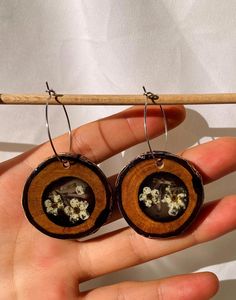 The original statement earrings with 925 silver hooks, are made with preserved Verbena flowers in apricot wooden frames. Epoxy resin is used to ensure the wood and flowers will stay in their natural form and you can wear and cherish them forever. They are elegant and bohemian at the same time, and very lightweight. Every item is one of a kind and can't be made again, making the creations not only unique but one of a kind as well.  Embrace the Beauty of Nature, Wear It Forever. Epoxy Resin Earrings, Earring Frame, Natural Form, Botanical Jewelry, Wooden Earrings, Natural Forms, Jewelry Silver, Real Flowers, Wooden Frames