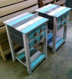 two side tables made out of pallet wood and painted in different shades of blue