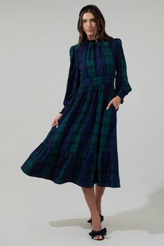 Lunches on the patio and afternoons in the garden just got a little cuter, thanks to the Hudson Plaid Caitlyn Smock Sleeve Midi Dress! Lightweight woven fabric features a classic plaid pattern as it falls from long bubble sleeves, shaping a smocked bodice with a keyhole tie in the back and a high waist. Add on your favorite jewelry and heels to complete the look.- Plaid- Pleated- Smocked- Keyhole- Color: Navy Green MultiSize + Fit - Model is 5'8" and wearing size XS- Measurements taken from size Casual Bride, Navy Midi Dress, Navy Green, Sleeve Midi Dress, Long Sleeve Midi, Long Sleeve Midi Dress, Plaid Dress, Navy And Green, Plaid Pattern