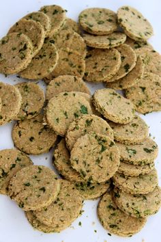 a pile of crackers sitting on top of a white plate