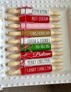 christmas candy pops are wrapped in red and green paper with the words peppermint, hot cocoa, gingerbread, cocoa & cookies