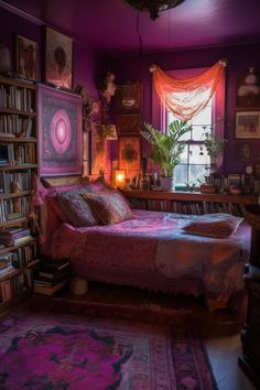 a bed sitting in a bedroom next to a book shelf filled with lots of books