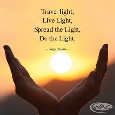 two hands are held up in front of a sunset with the words travel light, live light, spread the light, be the light