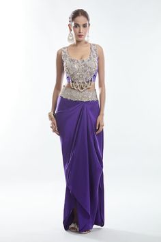 White, purple cape with zardozi, sequin, bead, thread embroidery in floral pattern. Paired with sleeveless embroidered blouse and waistband embroidered draped skirt. - Aza Fashions Elegant Purple Reception Sets, Elegant Embellished Purple Choli, Elegant Purple Choli For Parties, Festive Evening Purple Lehenga, Embellished Purple Evening Sets, Elegant Purple Choli With Pallu, Elegant Purple Choli With Traditional Drape, Traditional Purple Evening Sets, Draped Skirt Pattern