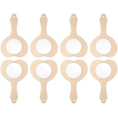 six wooden spoons with mirrors on them