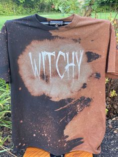 a t - shirt with the word witch written on it