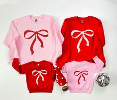 We're super excited to introduce our new family sweatshirts with the cutest bow design! They're perfect for celebrating christmas, family outings, going on family trips, or attending special events. These sweatshirts are a fun and stylish way to coordinate with your family or add a playful touch to your next squad celebration.  I T E M  D E S C R I P T I O N * Material: 100% Cotton   * Fit type: Our sweatshirts fit true to size. But if you're someone who likes to keep it casual and relaxed, we r Matching Sweatshirts, Mommy And Me Outfits, Mama Sweatshirt, Cute Bows, Mini Me, Christmas Sweatshirts, Winter Looks, Matching Outfits, Mommy And Me