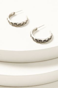 Set includes 6 earrings Piece 1: Silver-toned ear cuff with etched details Piece 2: Silver toned circular shaped hardware with etching details and center stone Piece 3: Ivory stone design with French hooks Piece 4: Silver-toned oval hardware with etching details Piece 5: Silver toned half hoop design with etched details Piece 6: Silver toned hardware with diamond etched details Imported Engraved Small Hoop Jewelry, Adjustable Etched Jewelry, Vintage Stamped Jewelry, Antique Silver Etched Metal Jewelry, Silver Dual-tone Metal Jewelry, Vintage Etched Earrings, Dual-tone Sterling Silver Round Jewelry, Earrings Piece, Vintage Etched Sterling Silver Earrings