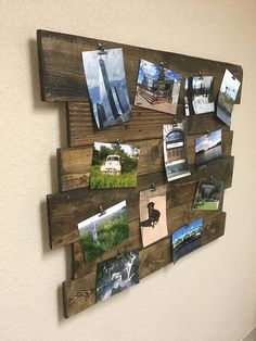 a wooden wall hanging with pictures and magnets attached to it's back side