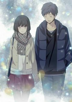 two people standing next to each other in front of snow flakes and sparkles