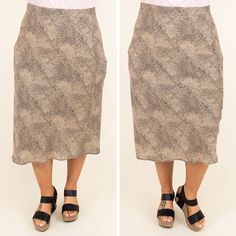 We can see you in this spotted beauty! This skirt has a beautiful taupe color with a leopard pattern that is a season favorite! The flirty, flowy fit is perfect wearing to the office or even a date night! Style this skirt with a sassy top and wedges for a treditional chic look! 100% Polyester Chic Flowy Leopard Print Skirt, Leopard Print Lined Bottoms With Relaxed Fit, Casual Flowy Leopard Print Skirt, Flowy Lined Leopard Print Skirt, Casual Leopard Print Flowy Skirt, Leopard Print Relaxed Midi Skirt, Leopard Print Relaxed Fit Midi Skirt, Chic Lined Leopard Print Skirt, Chic Leopard Print Lined Skirt