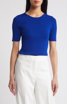 This lightweight, fine-gauge sweater provides a pop of color to perk up your everyday look. Jewel neck Short sleeves 72% rayon, 28% polyester Dry clean Imported Short Sleeve Sweater, Jewel Neck, Pop Of Color, Short Sleeved Sweaters, Sleeve Sweater, Everyday Look, Cobalt, Color Pop, Top Brands