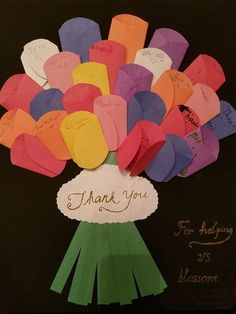 a bouquet of paper hearts with the words thank you for helping us blossom on it