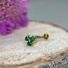 Want 10% off this item? Use code: IRIS10 on our website www.Houseofiris.co.uk Three Emerald Green CZ's set into a 14k Yellow gold double prong trio design.  Perfect for Vertical Labret, Rook, Daith, Eyebrow piercings. The top measures approx 5mm, bar length can be chosen and bottom ball size 3mm, both of which are anodised to a golden colour but it can never be a true match, please see photos for the colouring. I could also do it will smaller bottom ball or a flat disc, or could also be sent wit Gold Eyebrow Piercing, Eyebrow Piercing Jewelry Gold, Medusa Piercing Jewelry Emerald, Gold Eyebrow Ring, Gold Vertical Labret Jewelry, Hinged Ring, Eyebrow Piercing, Gold Top, Gold Piece