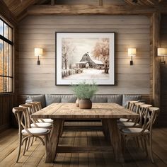 a dining room table with chairs and a bench in front of a painting on the wall