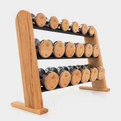 a wooden wine rack filled with lots of bottles