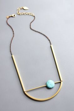 22" geometric necklace with turquoise and brass. 3 inch extender. Modern Turquoise Metal Jewelry, Modern Brass Necklace, Turquoise Brass Jewelry, Adjustable Turquoise Brass Necklace, Modern Bronze Brass Necklace, Gold Adjustable Minimalist Turquoise Necklace, Minimalist Adjustable Gold Turquoise Necklace, Adjustable Minimalist Gold Necklace, Turquoise Necklace With Adjustable Chain