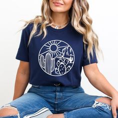 Looking for a cute versatile top to wear? Make sure to grab one of our Graphic tees! This soft and comfortable graphic tee is the perfect top for any outfit. It can be paired with biker shorts, jeans, or even a simple skirt/dress! This tee is true-to-size, so be sure to order your regular t-shirt size! If you are looking for a more oversized look, make sure to size up! Casual Navy Tops With Graphic Print, Navy Graphic Tee With Letter Print, Navy Graphic Print Crew Neck Top, Navy Graphic Tee With Screen Print, Navy Casual Tops With Screen Print, Navy Casual Top With Screen Print, Navy Relaxed Fit T-shirt With Graphic Print, Navy Graphic Tee With Graphic Print, Navy Crew Neck Graphic Tee