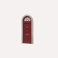 a red door with a white arch and window pane