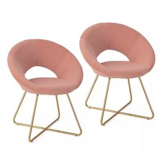 two pink chairs sitting next to each other on top of a white surface with gold legs