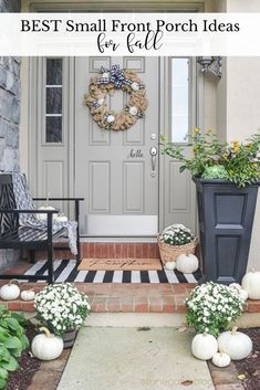 the front door is decorated with white pumpkins and greenery, while two chairs are on the porch