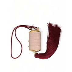 Pink Exotic Leather Mini Mirror Tassel Makeup Bag. 100% Exotic Leather. Neck Strap For Easy Carrying. Gold Metal Detailing. Clasp Closure. Gold Inner Lining. Logo Details Logo Engraved Metal Hardware. Made In Italy. High Craftsmanship. Measurements: 8cm X 5cm X 3cm. Strap: 55cm X 1cm. Material: 100% Exotic Leather. Luxury Formal Clutch With Tassels, Elegant Fringe Clutch For Formal Occasions, Elegant Fringe Clutch For Formal Events, Elegant Formal Evening Bag With Tassels, Elegant Beige Bags With Tassels, Formal Clutch Evening Bag With Tassels, Mirror Bag, Mini Mirror, Bag With Tassel