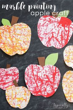 paper plate apple craft for kids on a blackboard with the words marble painting in red, yellow and green