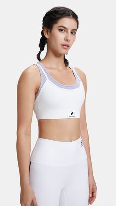 Made for medium to high-impact workouts, this cropped bra is featured in a breathable fabrication with a higher neckline and eye-catching strappy back detail. This double-layered bra keeps you feeling comfortable and supported. Ideal for medium-impact workouts, it has a double lining and adjustable straps. Team yours with leggings or shorts. DETAILS Medium-impact workouts Mid-weight, breathable, stretchy fabric Ribbed detailing Best For: Boxing, Running, Cycling, HIIT, Studio or Outdoor SIZES+FI White Breathable Sports Bra For Pilates, Breathable White Sports Bra For Pilates, Breathable Cropped Sports Bra For Sports, Breathable Cropped Sports Bra For Yoga, Breathable Cropped Sports Bra For Workout, Breathable Compressive Cropped Sports Bra, Compressive Breathable Cropped Sports Bra, Functional Cropped Sports Bra, Compressive Cropped Breathable Sports Bra