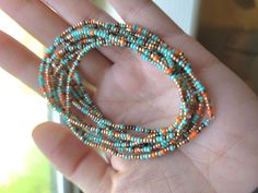 This listing is for a set of ten seed bead boho beaded bracelets. These southwestern style multi color confetti bracelets have dainty, tiny beads and are strung on strong elastic. They are double knotted and glued shut. These stretchy, stackable bracelets would be cute friendship bracelets or gifts for best friends, gifts for her. Bohemian Multi-strand Spacer Beads Jewelry, Southwestern Hand Wrapped Beaded Bracelets, Bohemian Stretch Bracelet With Round Beads For Summer, Southwestern Beaded Wrap Bracelet As Gift, Bohemian Stackable Stretch Bracelet For Festivals, Bohemian Stackable Summer Jewelry, Bohemian Stackable Beaded Bracelets In Turquoise, Stackable Bohemian Turquoise Beaded Bracelets, Stackable Round Beads Jewelry For Festivals