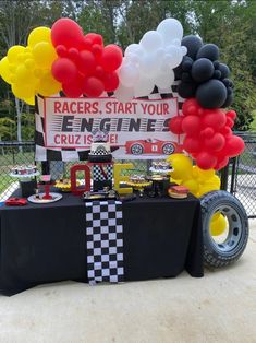 a race car themed birthday party with balloons