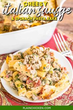 a white plate topped with pasta and meat