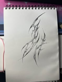 a drawing of a bird on a piece of paper