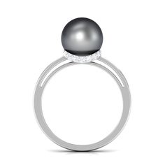 Product Details Awe inspiring Tahitian Pearl Solitaire Engagement Ring is artistically crafted in gold. This Tahitian Pearl is held in Bead Setting beautifully and Diamond is forming an enchanting surprise Halo for captivating appeal. Simple Tahitian Pearl Ring is an alluring fine jewelry, your lovely lady will love this Solitaire Ring for sure. Product Information SKU SHP-RINGS072210035 Weight 2.08 gm (Approximate) TAHITIAN PEARL INFORMATION No.of Stones 1 Pieces Total Weight 7.50 Carat (Approx Tahitian Pearl Ring, Ring With Diamond, 18k Yellow Gold Ring, Tahitian Pearls, Tahiti, Solitaire Engagement, Pearl Ring, Solitaire Engagement Ring, Awe Inspiring