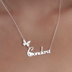 "Personalised Name Necklace,Custom Birth Butterfly Name Necklace is made by hand in our workshop with care. All our jewelry is the most elegant choice for the Bridesmaids, friends, your loved ones and for yourself. Personalised Name Necklace,Custom Birth Butterfly Name Necklace * Material: High Quality Solid 925 Sterling Silver. * Dimensions: Depending on your font choice, height sizes range from 1,5 mm to 3,5 mm lowercase. * Finish: Sterling Silver ∙ Gold ∙ Rose Gold. HOW TO ORDER ❓ * Select your necklace COLOR. * Choose necklace length from 14\" to 22\". The length option is the TOTAL chain length (including the charm). If you order an 18\" chain, the piece will come as CHAIN + CHARM = 18\".  * Finish your payment and complete your order. PRODUCTION TIME 🕒 All items made to order. Produ Custom Silver Necklace For Birthday And Valentine's Day, Handmade Silver Name Necklace For Birthday Gift, Handmade Sterling Silver Name Necklace For Birthday, Handmade Silver Name Necklace For Birthday, Butterfly Name Necklace, Silver Heart-shaped Custom Name Necklace, Hallmarked Sterling Silver Name Pendant Necklace, Customizable Silver Heart-shaped Name Necklace, Personalized Silver Butterfly Pendant Necklace