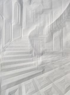 an abstract photo of stairs and steps in white