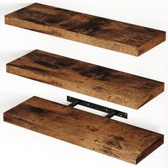 three wooden shelves with metal brackets on them